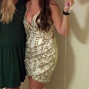 White and gold sequin dress